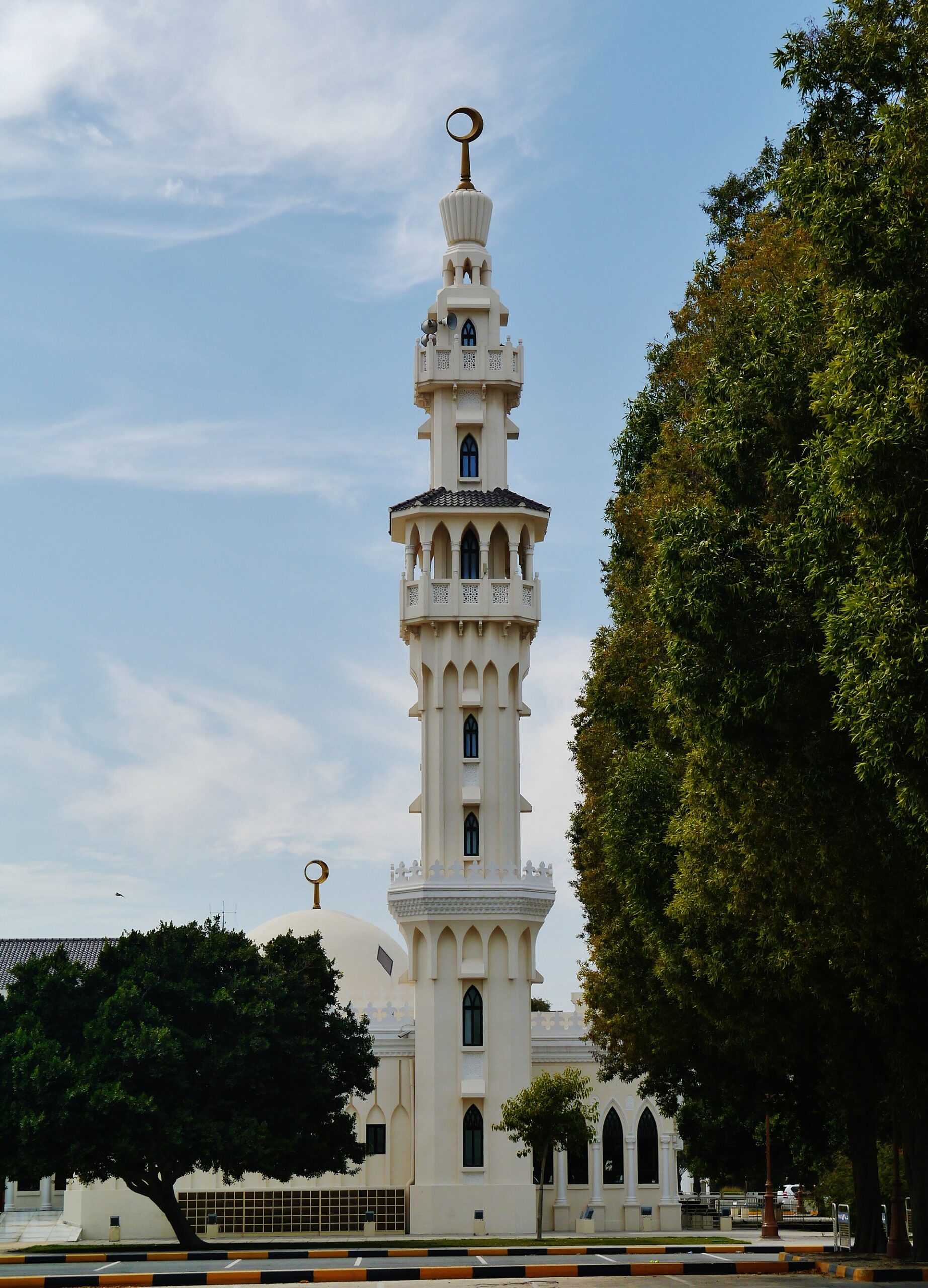 White minaret tower of a mosque